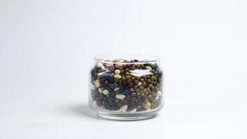 Glass container of mixed dried beans video