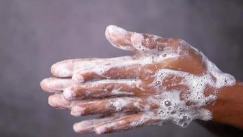 Washing hands with foamy soap video