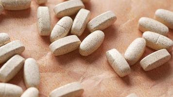 Beige tablets of vitamins video