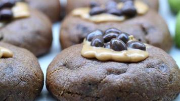Chocolate caramel cookies close up texture video
