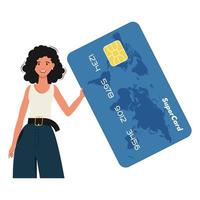 A woman holds a credit card in her hands. Isolated on white vector