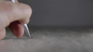 Close-up of a ballpoint pen writing on paper video