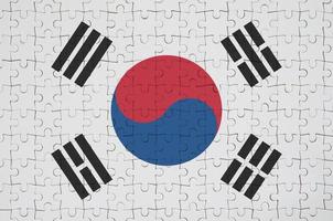 South Korea flag is depicted on a folded puzzle photo