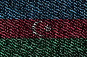 Azerbaijan flag is depicted on the screen with the program code. The concept of modern technology and site development photo