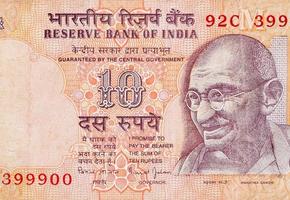 Mahatma Gandhi face on Indian bank note ten rupees. 10 Rupee National currency of India photo