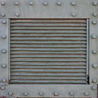 The texture of the wall of the tank, made of metal and reinforced with a multitude of bolts and rivets. Images of the covering of a combat vehicle from the Second World War photo