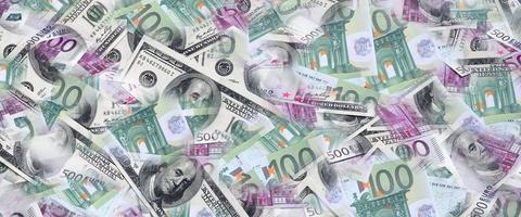 A collage of many images of euro banknotes in denominations of 100 and 500 euros lying in the heap photo