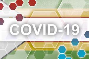 Zimbabwe flag and futuristic digital abstract composition with Covid-19 inscription. Coronavirus outbreak concept photo