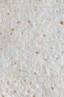 pan de pita plano casero textura de fondo de lavash turco vista superior foto