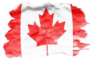 Canada flag is depicted in liquid watercolor style isolated on white background photo