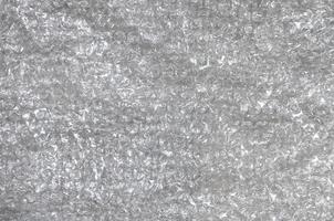 White bubble Wrap Packing Or Air Cushion material. Abstract Texture For Creative Art Work, Close Up dfckground, Top View with Copy Space photo