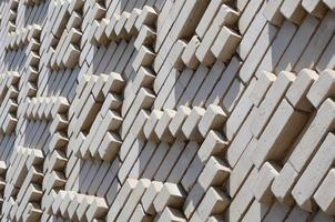 A pattern made of white bricks in the form of diamond shapes. Decoration of the walls during the Soviet Union photo