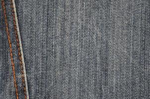 Detailed texture of dark denim cloth photo