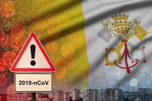 Vatican City State flag and Coronavirus 2019-nCoV alert sign. Concept of high probability of novel coronavirus outbreak through traveling tourists photo