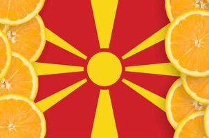 Macedonia flag in citrus fruit slices vertical frame photo