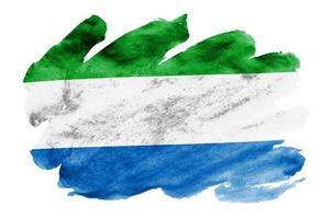 Sierra Leone flag is depicted in liquid watercolor style isolated on white background photo