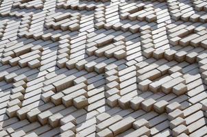 A pattern made of white bricks in the form of diamond shapes. Decoration of the walls during the Soviet Union photo