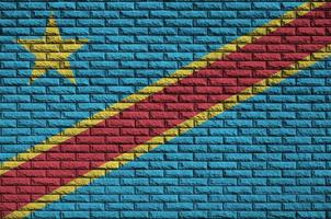 Democratic Republic of the Congo flag is painted onto an old bri photo