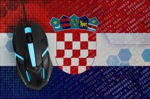 Croatia flag and computer mouse. Digital threat, illegal actions on the Internet photo
