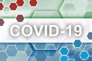 Sierra Leone flag and futuristic digital abstract composition with Covid-19 inscription. Coronavirus outbreak concept photo