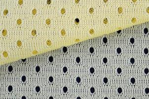 Yellow mesh sport wear fabric textile background pattern photo