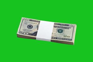 Bundle of US dollar bills isolated on chroma keyer green. Pack of american money with high resolution on perfect green mask photo