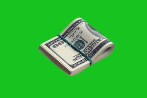 Bundle of US dollar bills isolated on chroma keyer green. Pack of american money with high resolution on perfect green mask photo