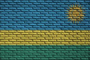 Rwanda flag is painted onto an old brick wall photo