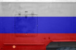 Russia flag depicted on side part of military armored truck closeup. Army forces conceptual background photo