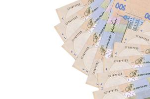 500 Ukrainian hryvnias bills lies isolated on white background with copy space. Rich life conceptual background photo