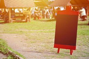 A large board as a menu for an open-air restaurant in a mountainous area. Free space for your text photo