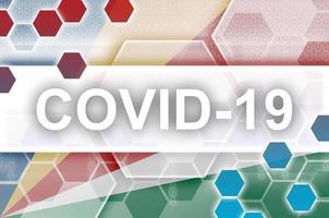 Seychelles flag and futuristic digital abstract composition with Covid-19 inscription. Coronavirus outbreak concept photo