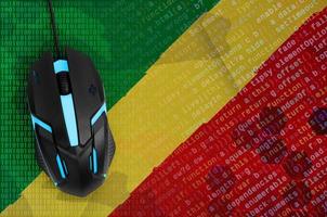 Congo flag and computer mouse. Digital threat, illegal actions on the Internet photo
