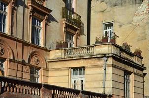 Fragment of the architecture of partially restored old houses in Lviv, Ukraine photo