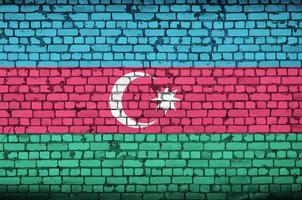 Azerbaijan flag is painted onto an old brick wall photo