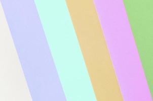 Texture background of fashion pastel colors. Pink, violet, orange, green, beige and blue geometric pattern papers photo