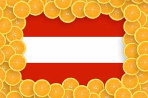 Austria flag in fresh citrus fruit slices frame photo