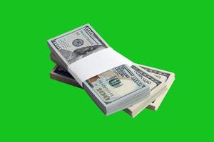 Bundle of US dollar bills isolated on chroma keyer green. Pack of american money with high resolution on perfect green mask photo