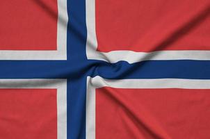 Norway flag is depicted on a sports cloth fabric with many folds. Sport team banner photo