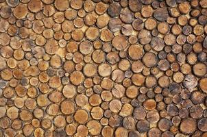 Decorative fence of wooden blocks photo