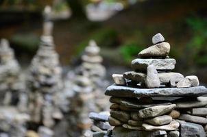 A strange composition of small mountain rocks. imitation of ancient buildings on a reduced scale photo