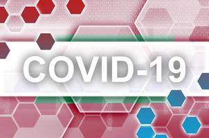 Maldives flag and futuristic digital abstract composition with Covid-19 inscription. Coronavirus outbreak concept photo