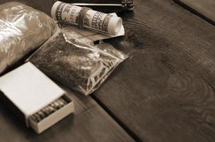 Items for preparing and rolling marijuana cannabis joint. Drugs narcotic concept photo