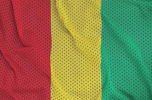 Guinea flag printed on a polyester nylon sportswear mesh fabric photo