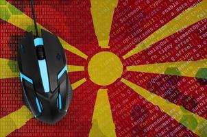 Macedonia flag and computer mouse. Digital threat, illegal actions on the Internet photo