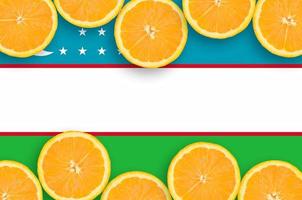 Uzbekistan flag in citrus fruit slices horizontal frame photo