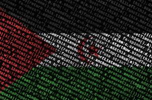 Western Sahara flag is depicted on the screen with the program code. The concept of modern technology and site development photo