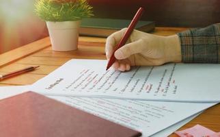 English proofreading paper on table in office photo