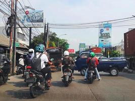 West Java, Indonesia in September 2022. Road congestion or vehicle density that occurs on Jalan Raya Bekasi. photo