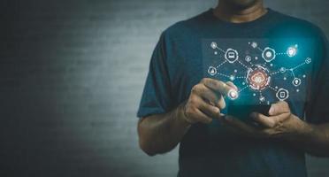 Man holding smart mobile phone use finger touch on mobile screen with cloud computing diagram show on hand. Cloud technology. Data storage. Networking and internet service. Business technology concept photo